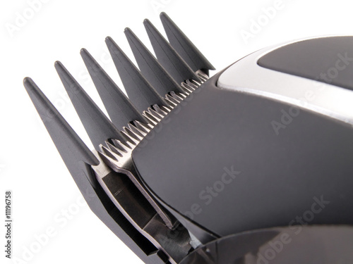 Photo: detail of a modern electric hair / beard trimmer detail of a modern electric hair / beard trimmer