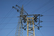 Two Power lines across in front of blue sky