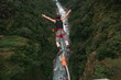 bungee jumper falling from cliff