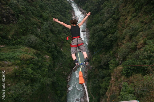 Photo: bungee jumper falling from cliff bungee jumper falling from cliff