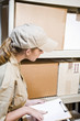 Worker taking inventory