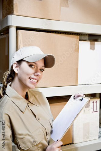Photo: Worker taking inventory Worker taking inventory
