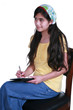 Teenage girl taking notes
