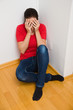Foto: anxious woman symbol of violence in the family anxious woman symbol of violence in the family