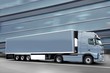 blue semi truck in the street