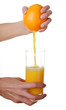 hands and glass of juice hands and glass of juice