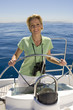 Woman steering boat