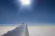 Aerial view of airplane wing and cloudy sky