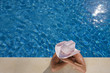 Woman swimming laps in swimming pool