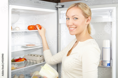 Girl at a refrigerator