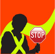 a working man with stop sign