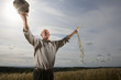 Farmer standing in field