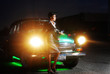 girl standing next to a vintage car girl standing next to a vintage car