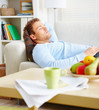Man asleep on sofa in living room