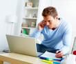 Modern life - Man using laptop and calling with cell phone