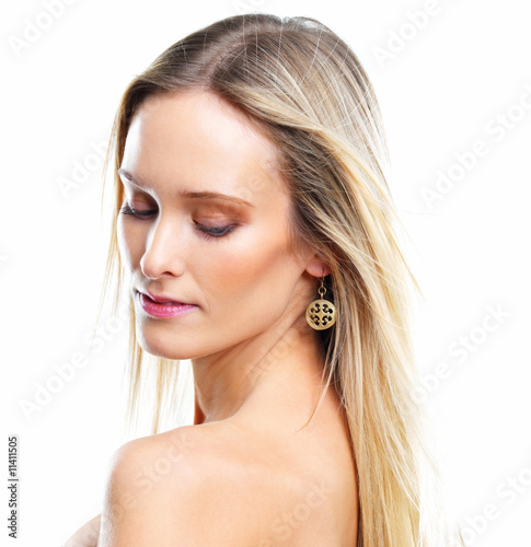 Portrait of naked blond female on white background