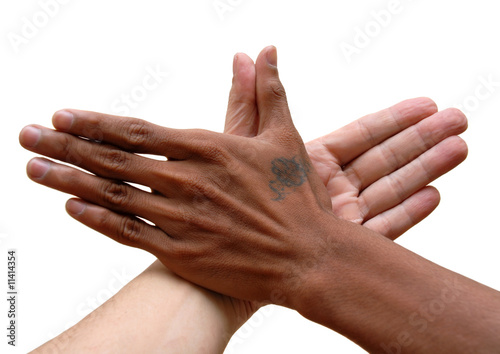 Photo: African and Caucasian hand united African and Caucasian hand united