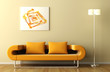 orange couch lamp and picture