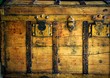 Old wooden chest, trunk in golden color Old wooden chest, trunk in golden color