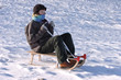 sledding in the snow