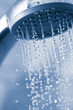 water flowing from metal shower