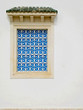 Traditional blue shutters in Tunisia Traditional blue shutters in Tunisia