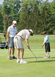 Family Playing Golf Family Playing Golf