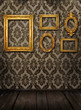 Gold frames, retro wallpaper, spotlights from above