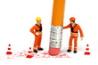 Miniature engineer or technician erases a mistake. Miniature engineer or technician erases a mistake.