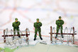 Miniature border patrol guarding the USA/Mexico border