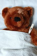 sick teddy with injury in bed sick teddy with injury in bed