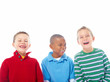 Closeup portrait of three small kids laughing over white backgro