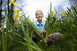 Young girl watching a hedgehog