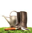 Garden boots with tool and watering can