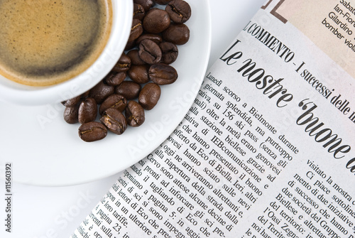 Cup of coffee and newspaper