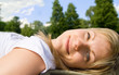 carefree blonde in the grass