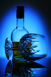 glass of wine on blue background