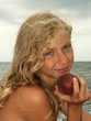 Young girl with peach