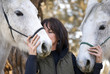 Woman Showing Affection to her Horses