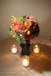 Floral centerpiece with candles