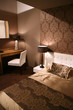 bed room in brown colors