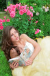 princes in white-golden gown with book