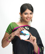 Woman in sari with CD