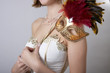 Girl in evening dress with a carnival mask