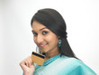 Indian woman holding credit card