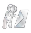 A manikin looks over letters in magnifying glass