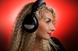 Blond woman listening to the music