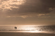 Retired couple on beach at Sunset
