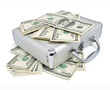 Photo: packs of dollars money on the silver suitcase packs of dollars money on the silver suitcase
