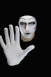 The mime isolated íû a black background.